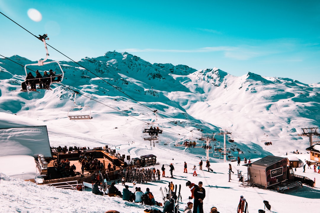 crowd gathered on snowy mountain park, Val Thorens