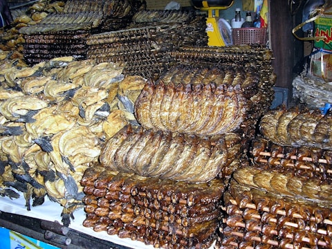 Stacks of dry fish products ready for bulk export.