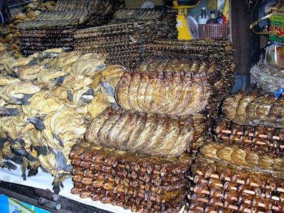 Close-up of traditional salted cod fillets neatly stacked in the factory.