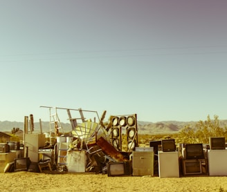 home appliance in the middle of the desert during daytime