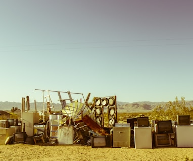 home appliance in the middle of the desert during daytime