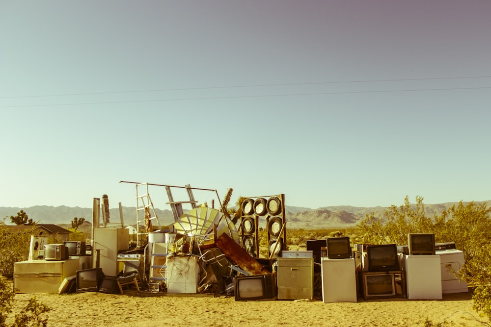 home appliance in the middle of the desert during daytime