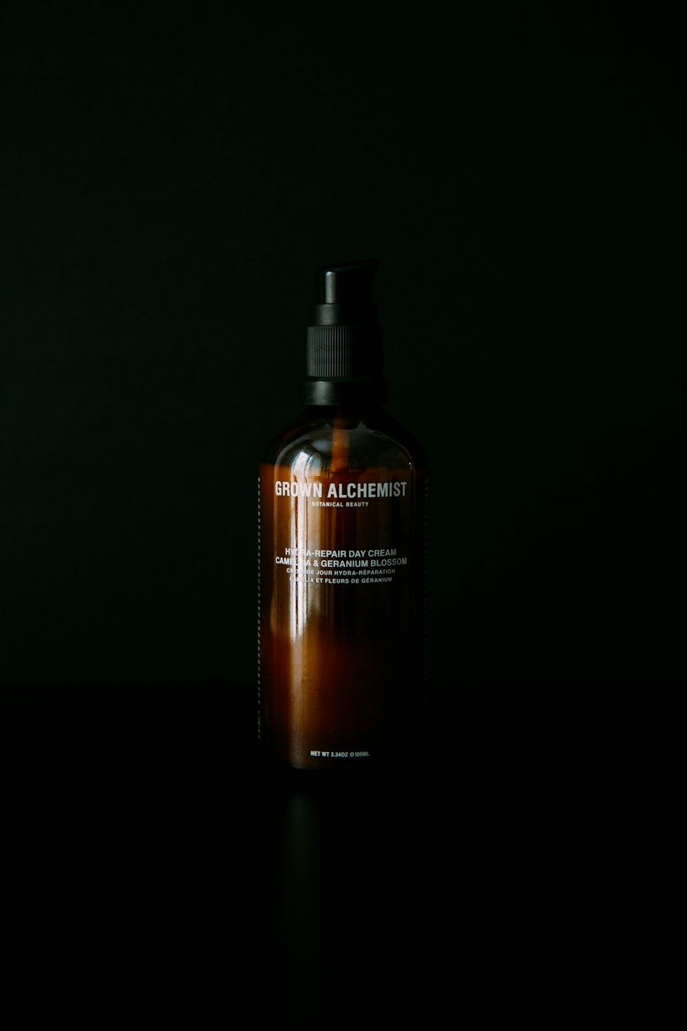 Grown Alchemist bottle with black background