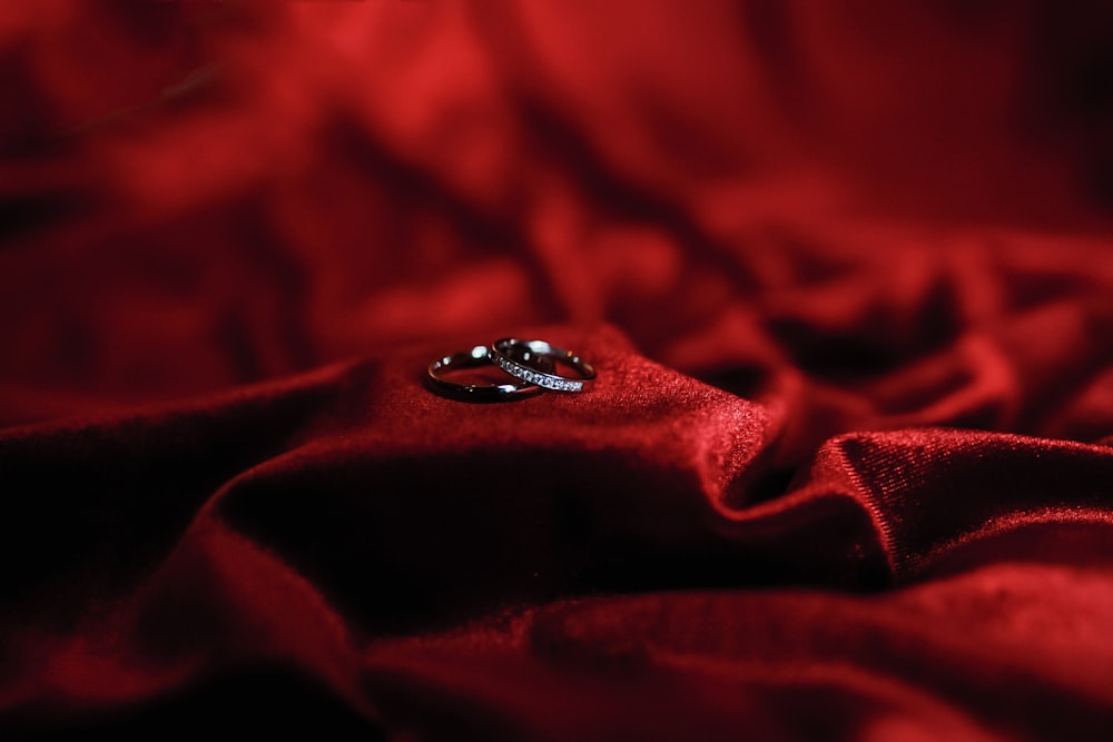 focused photo of a silver-colored rings