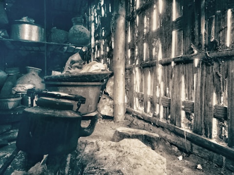 A warmly lit kitchen with pots simmering, ready for the next batch of meals.