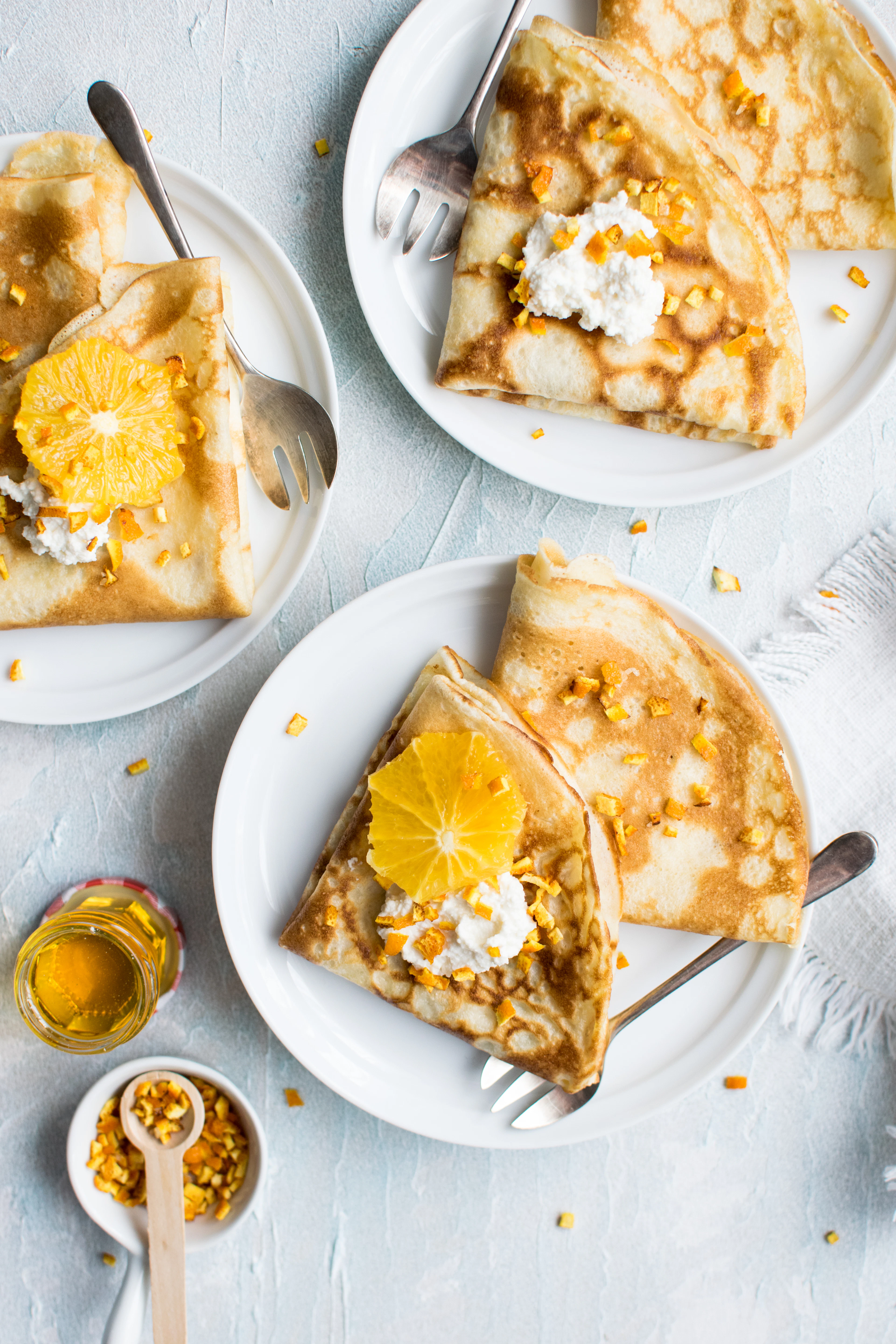 Dessert plates glistening with syrup