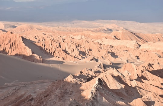 brown hills under blue sky in Atacama Desert Chile