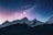 snow mountain under stars
