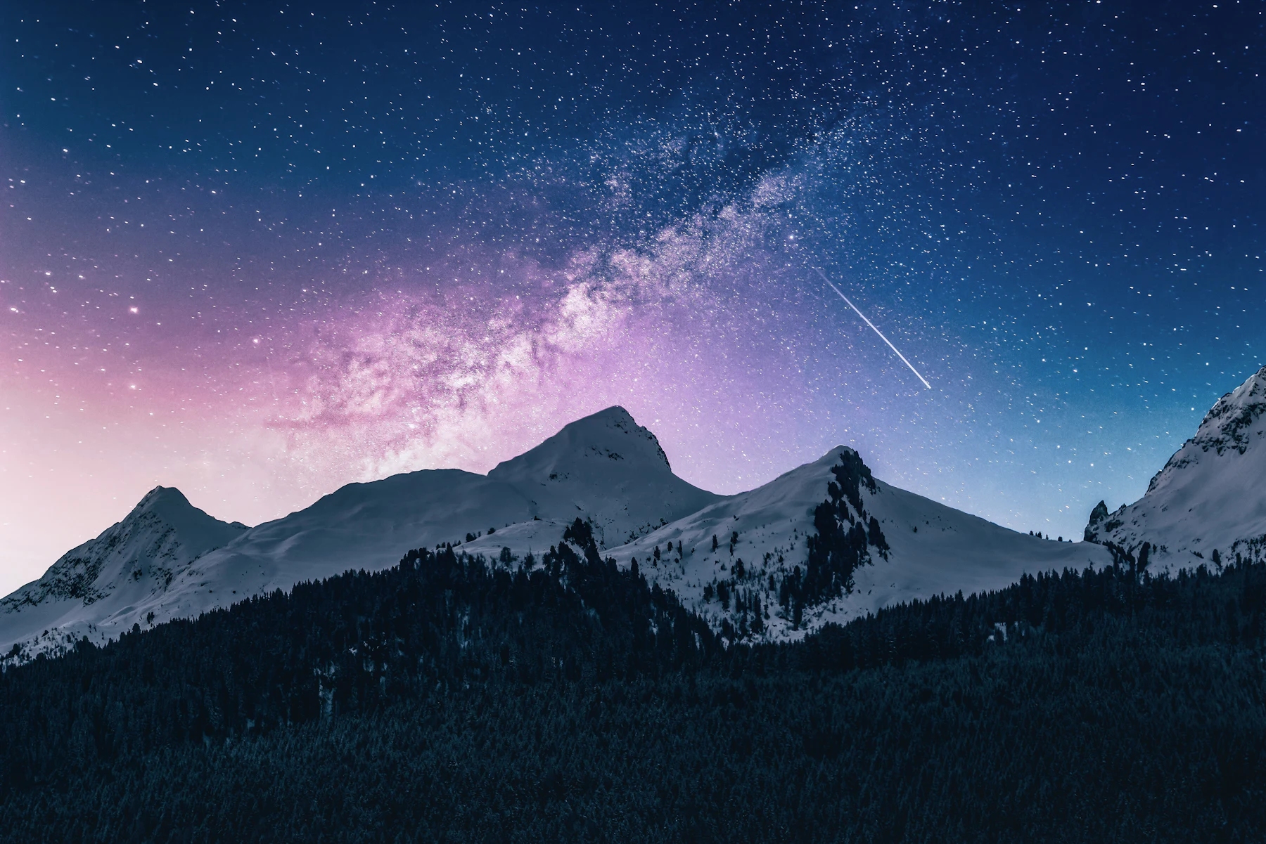 Mountain range under a clear night sky