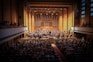 people watching orchestra