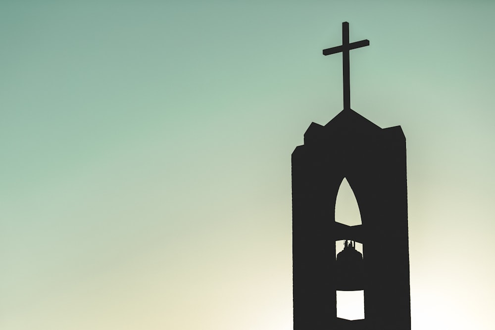 silhouette photo of church bell