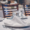 clear glass cup on table