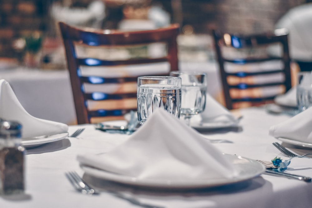 clear glass cup on table