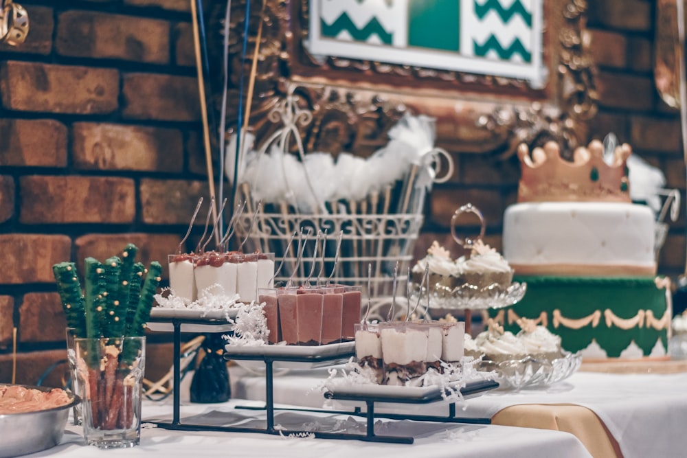 assorted desserts on top of table