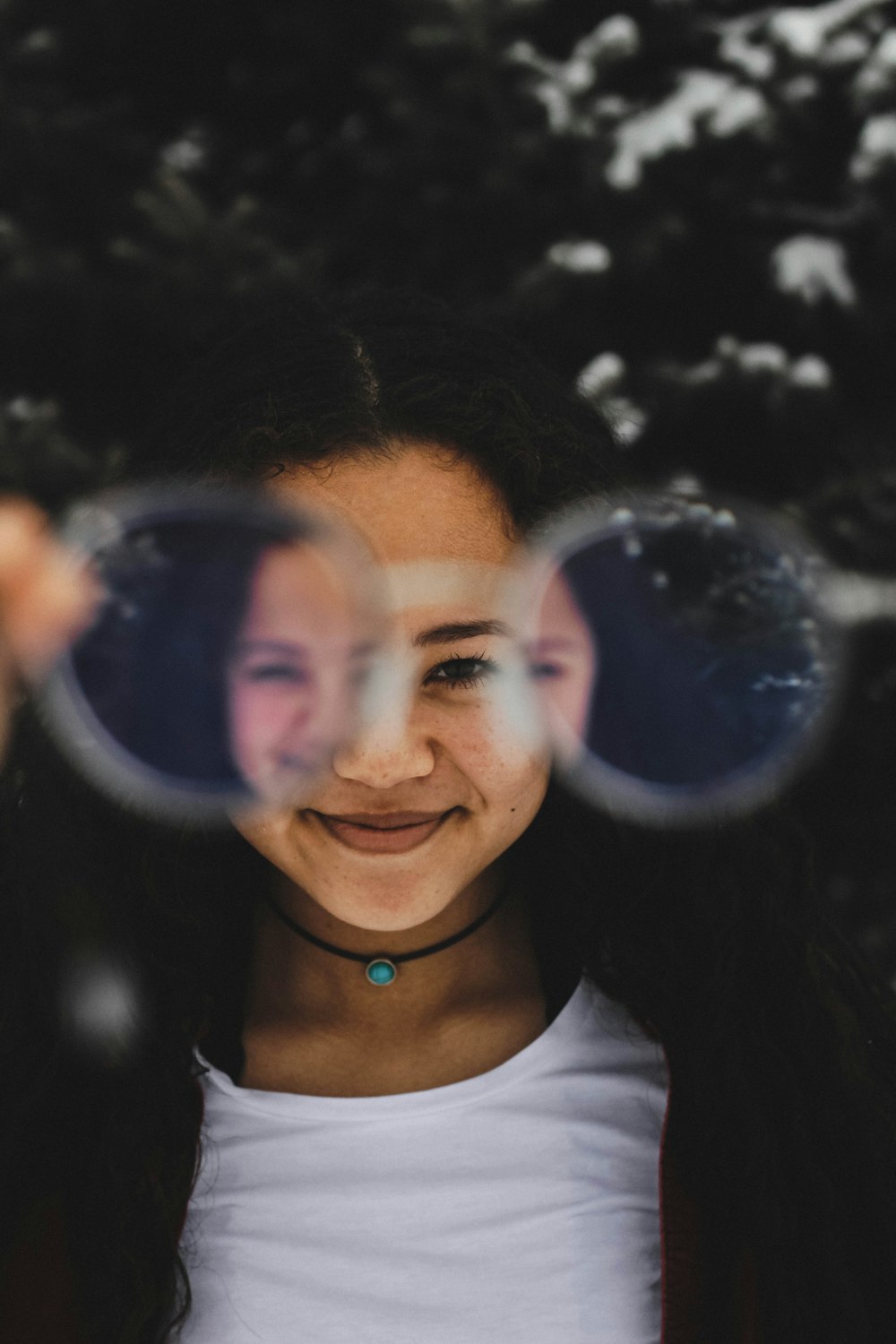 woman through eyeglasses photograph