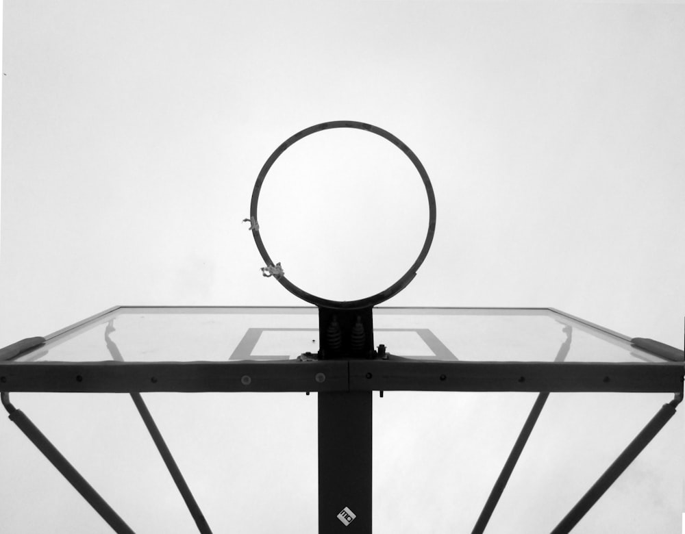 low angle photograph ogblack and white basketball hoop