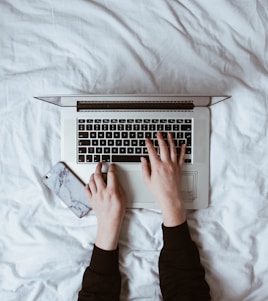 person using laptop computer
