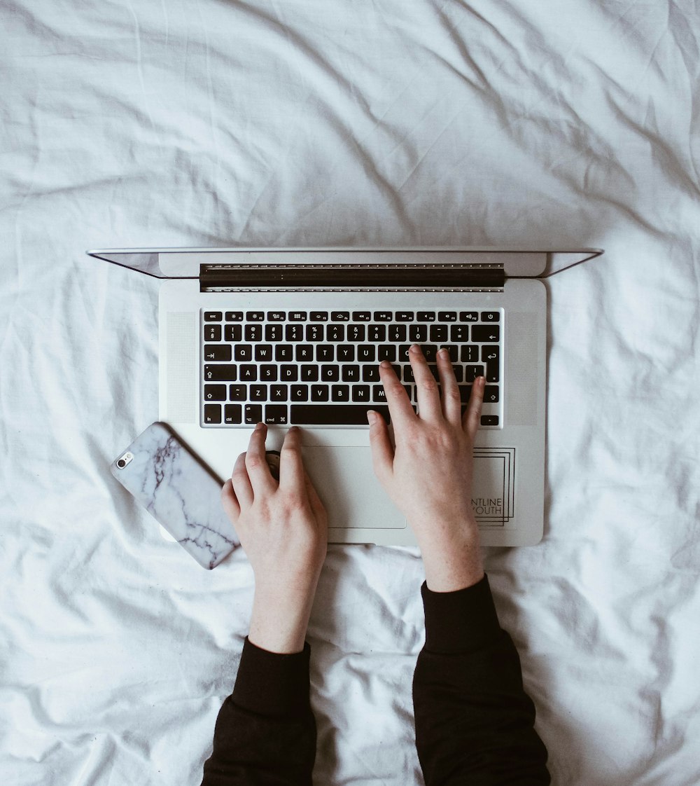 person using laptop computer