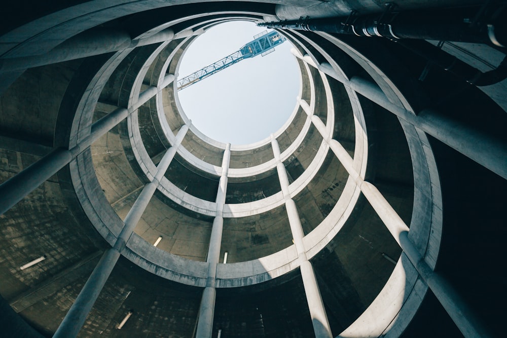 low angle photography of tubular building interior during day