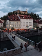 A scenic European landscape featuring historic architecture and vibrant streets.