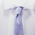 close up photo white collared shirt with blue necktie