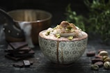 white and gray ceramic bowl on tbale