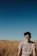 man on grassland during daytime