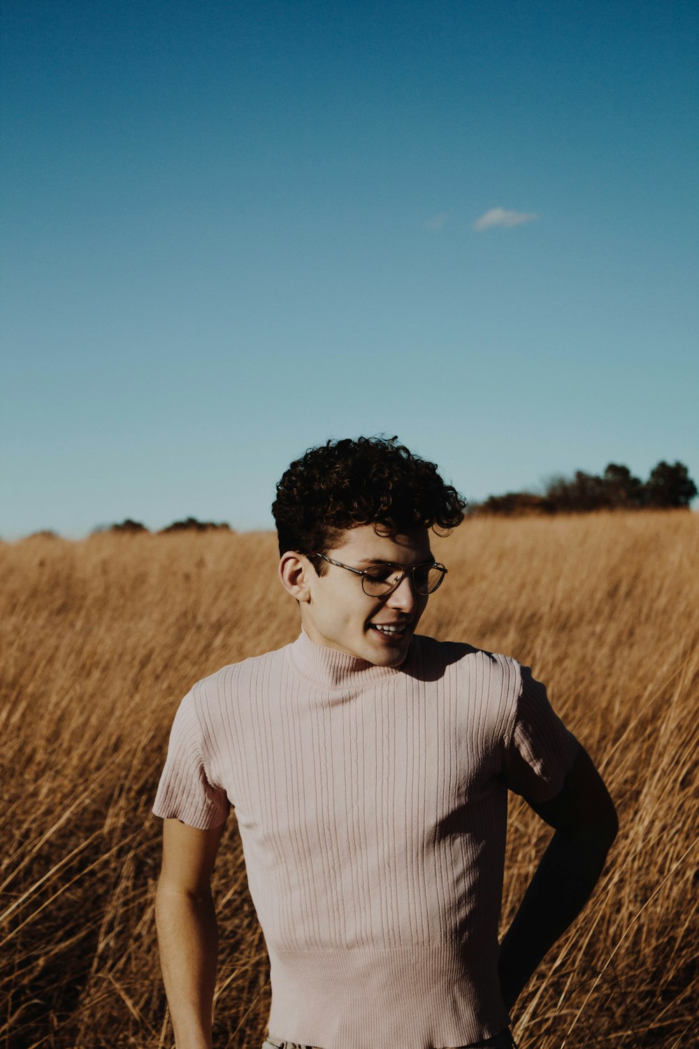 portrait photography of man standing on ground