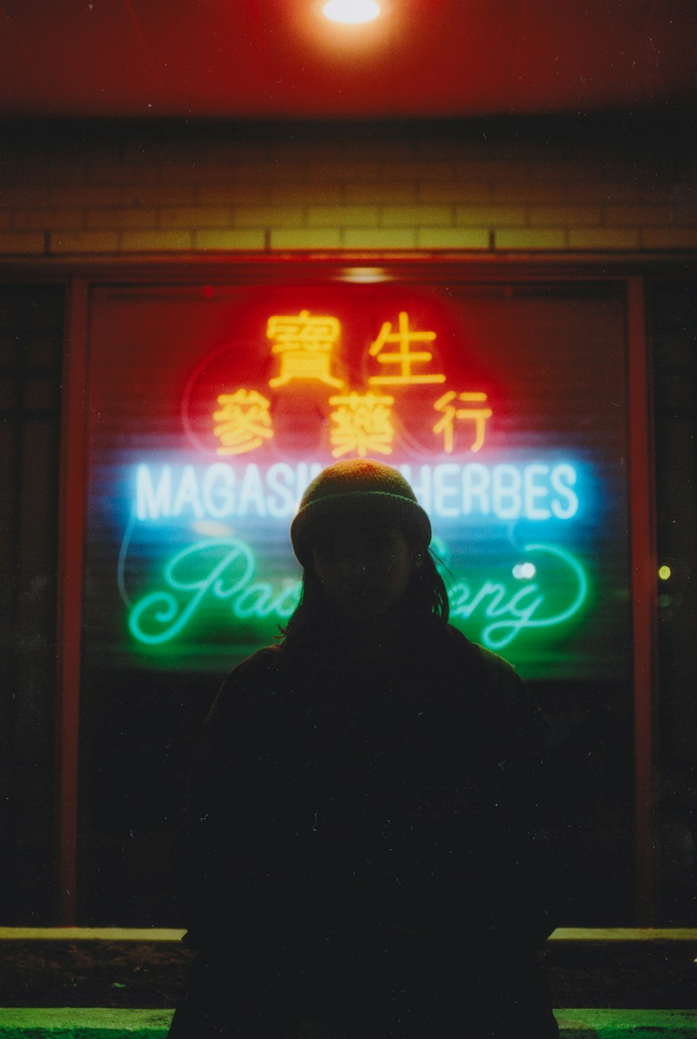 person standing in front of LED signage