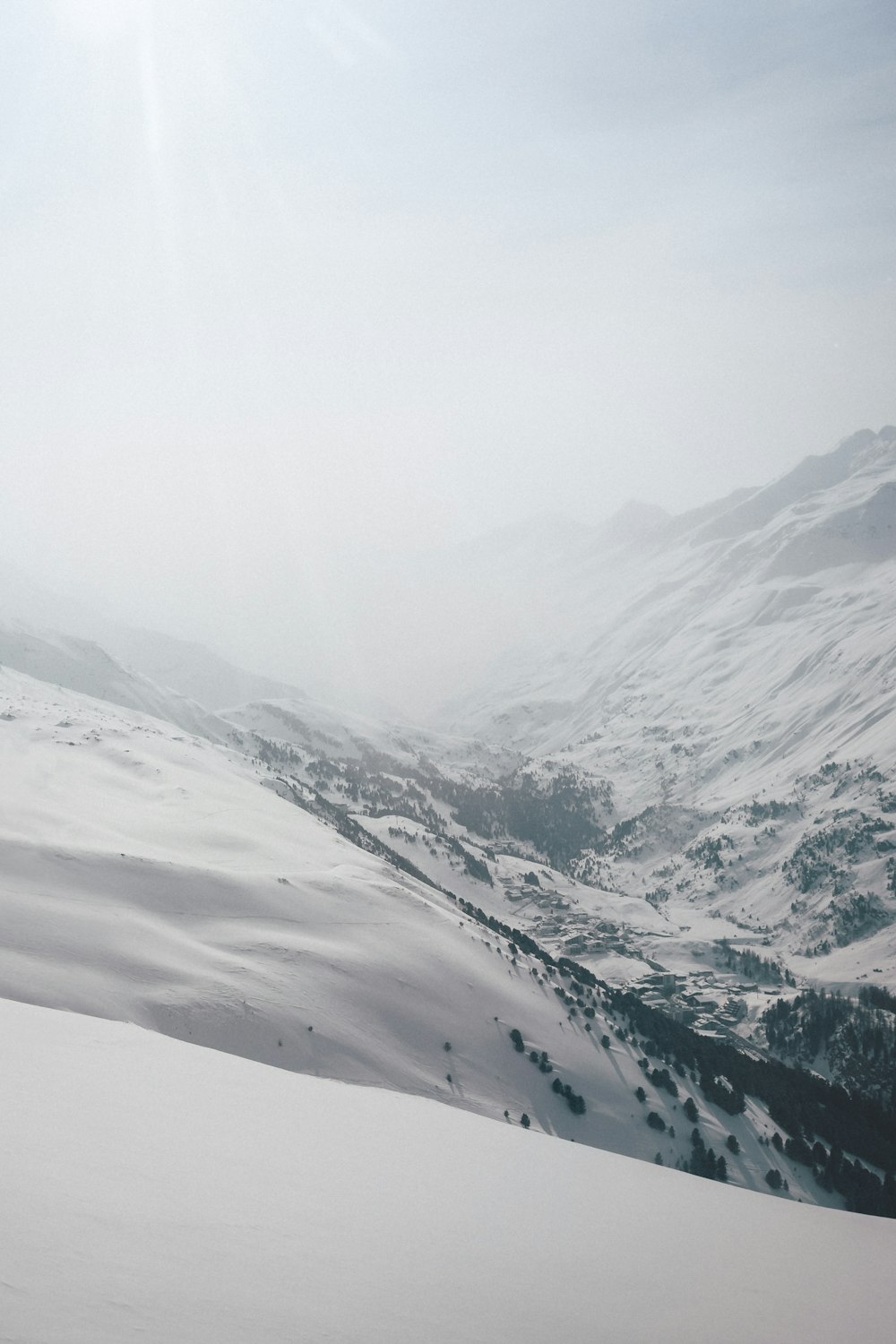 snowy mountain under sun light