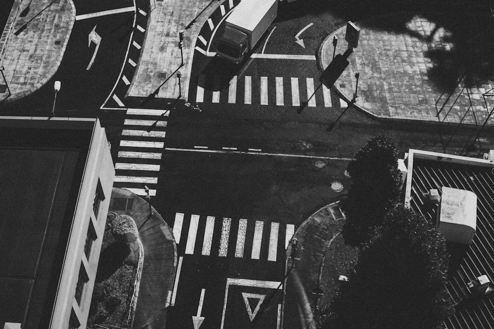 grayscale aerial photo of pedestrian