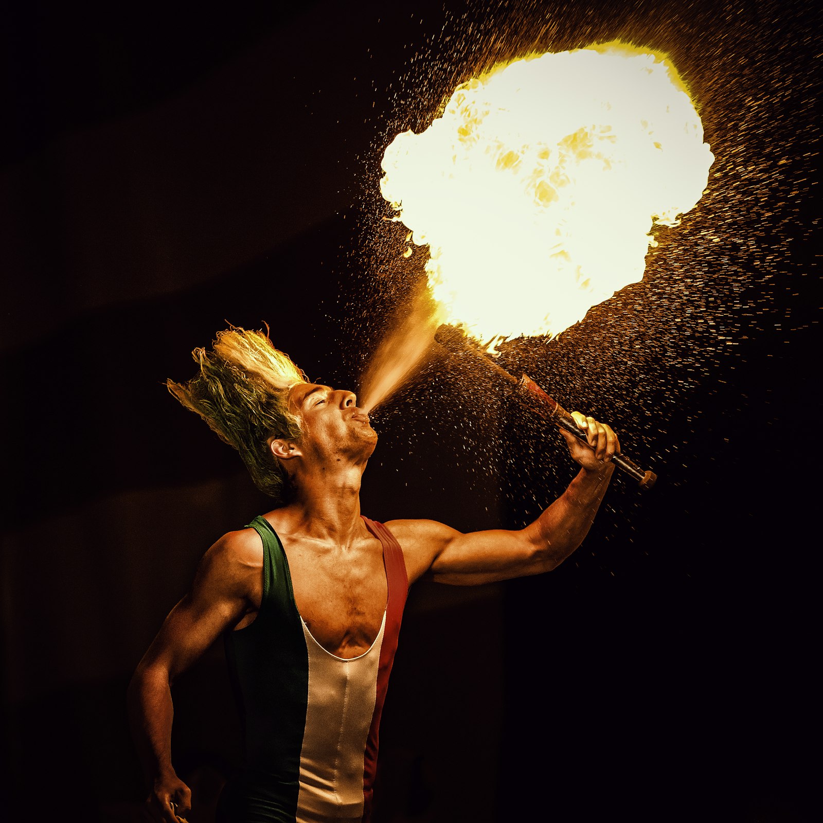 Canon EOS 5D Mark II + Canon EF 70-200mm F4L IS USM sample photo. Man blowing gas on photography