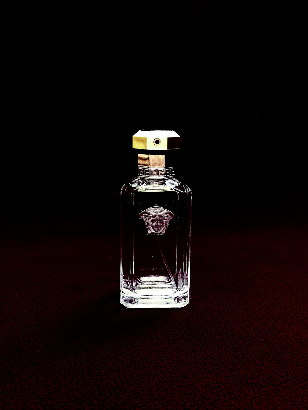 clear Versace glass fragrance bottle
