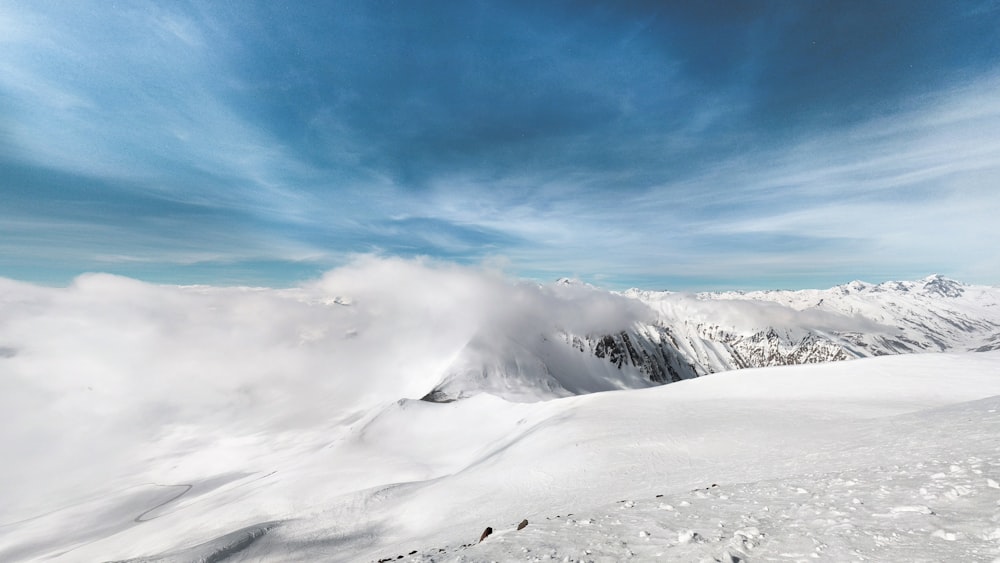 smoking snow-covered mountain