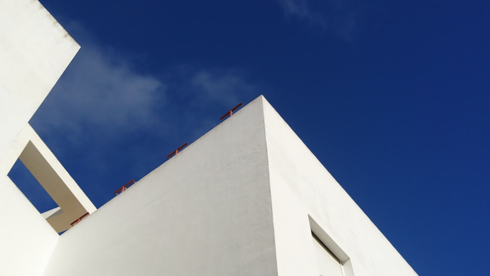 white concrete structure under blue sky during daytime