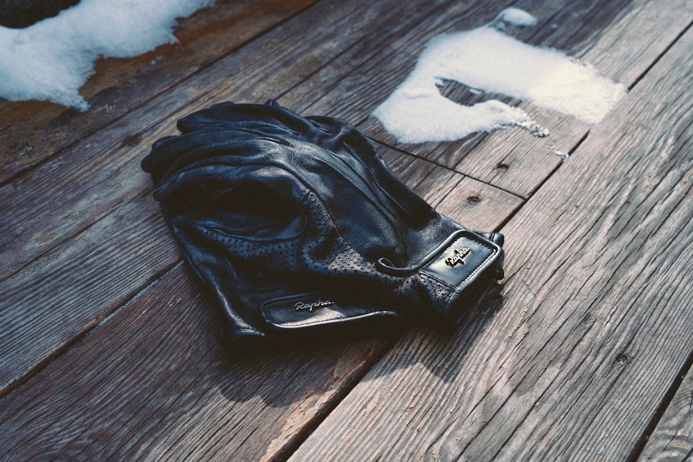 leather bag on wooden surface