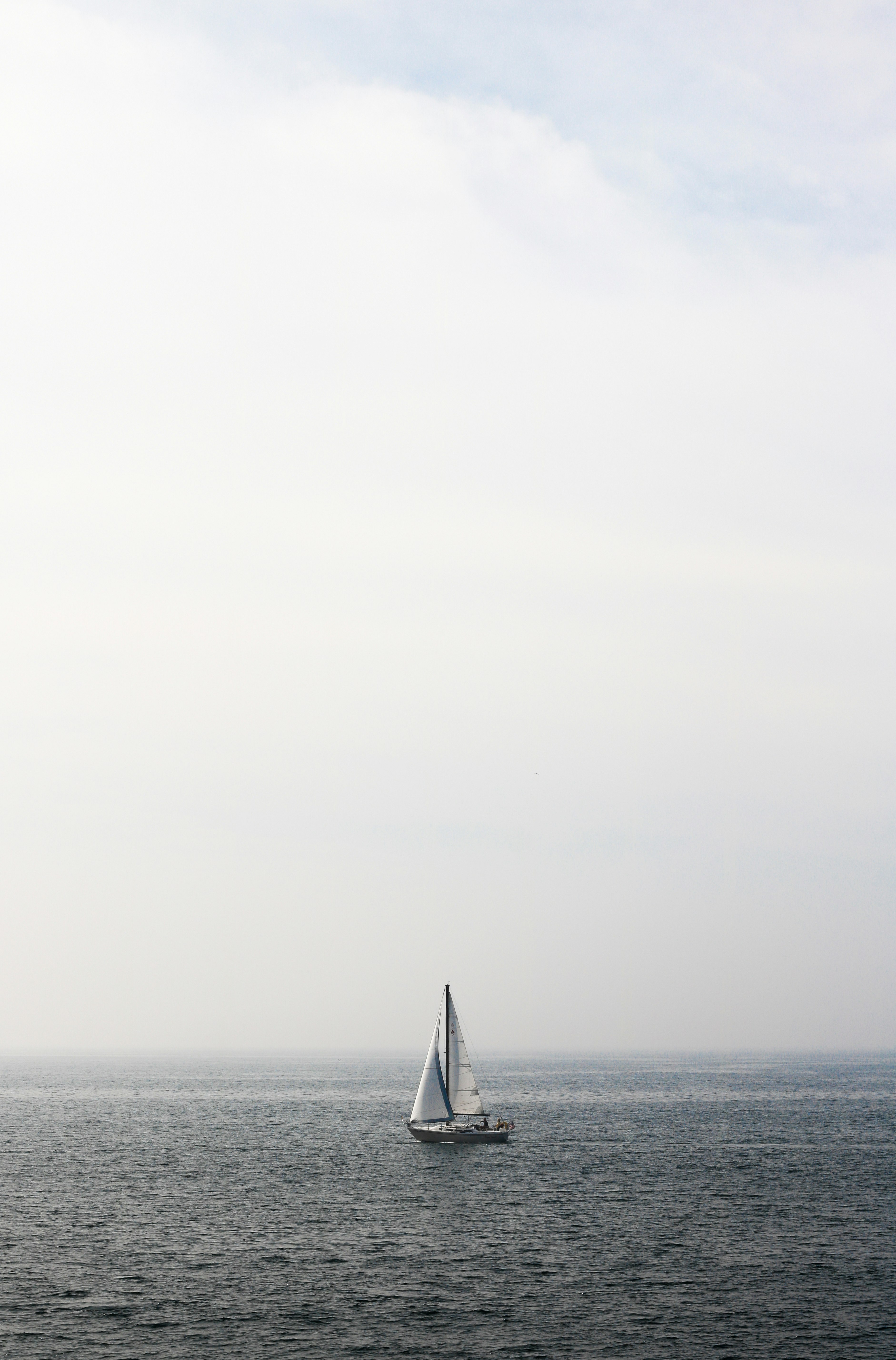 boat sailing in body of water