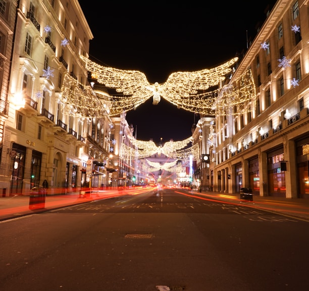 lighted string lights in the street