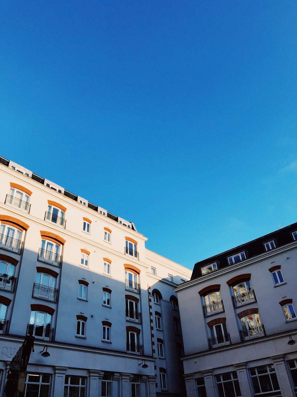 white concrete buildings during day time