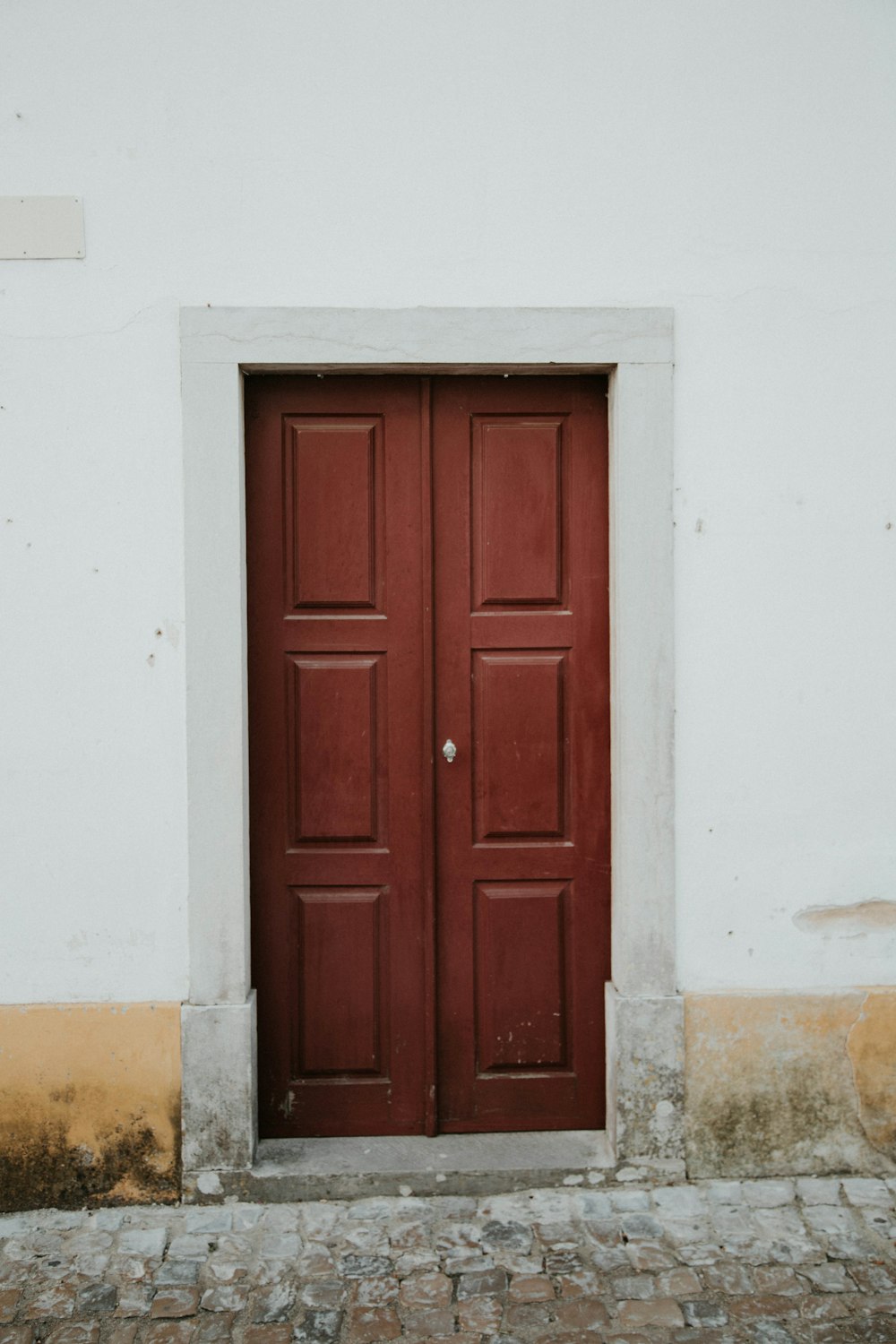 brown wooden 6-panel door close