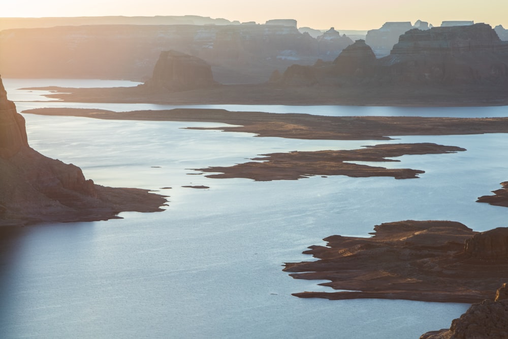 aerial view of mountains and body of water