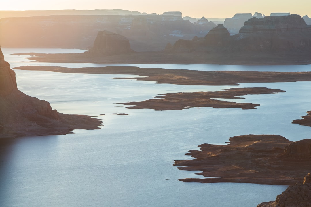 aerial view of mountains and body of water