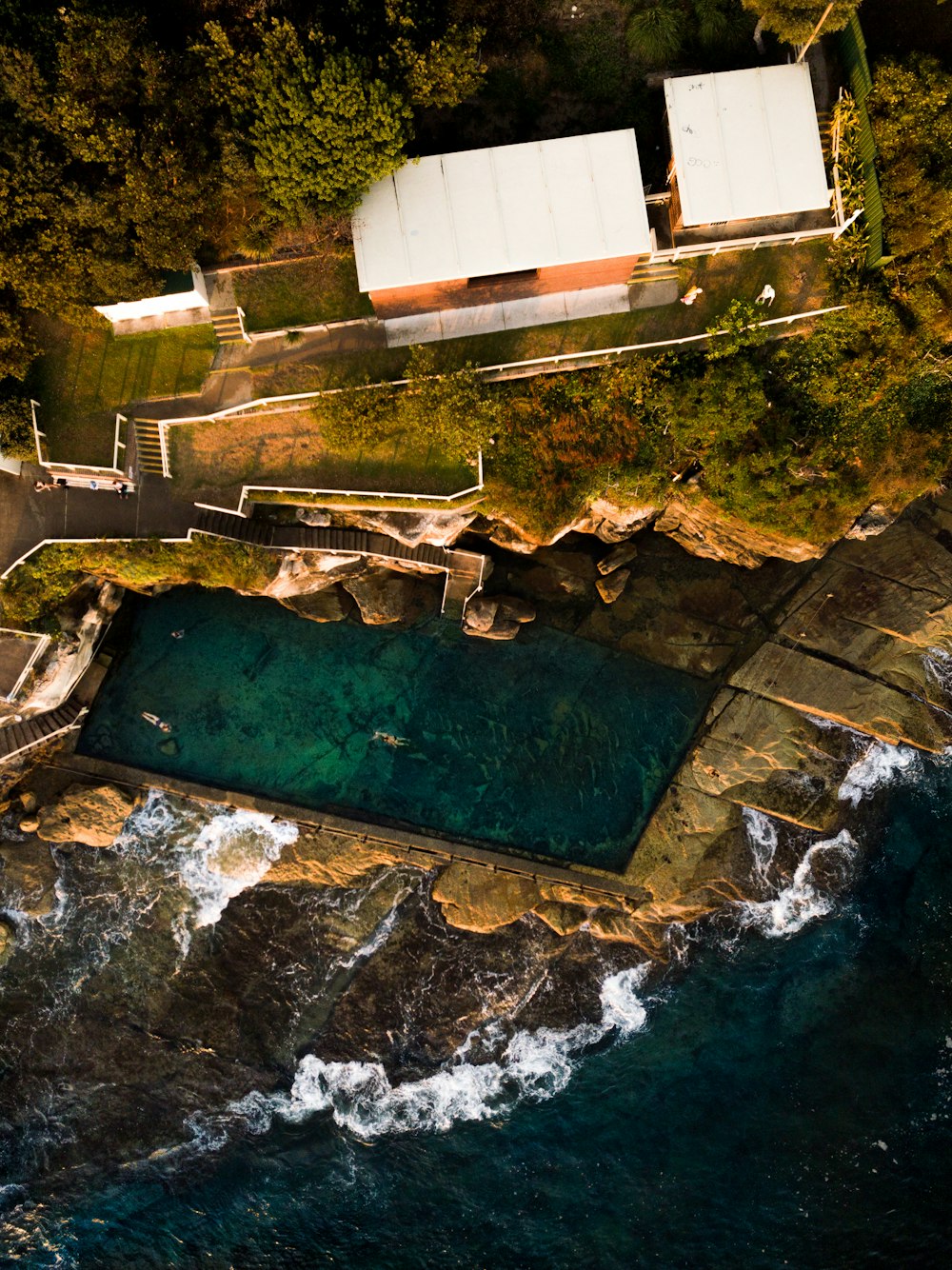 aerial photography of pool resort near ocean