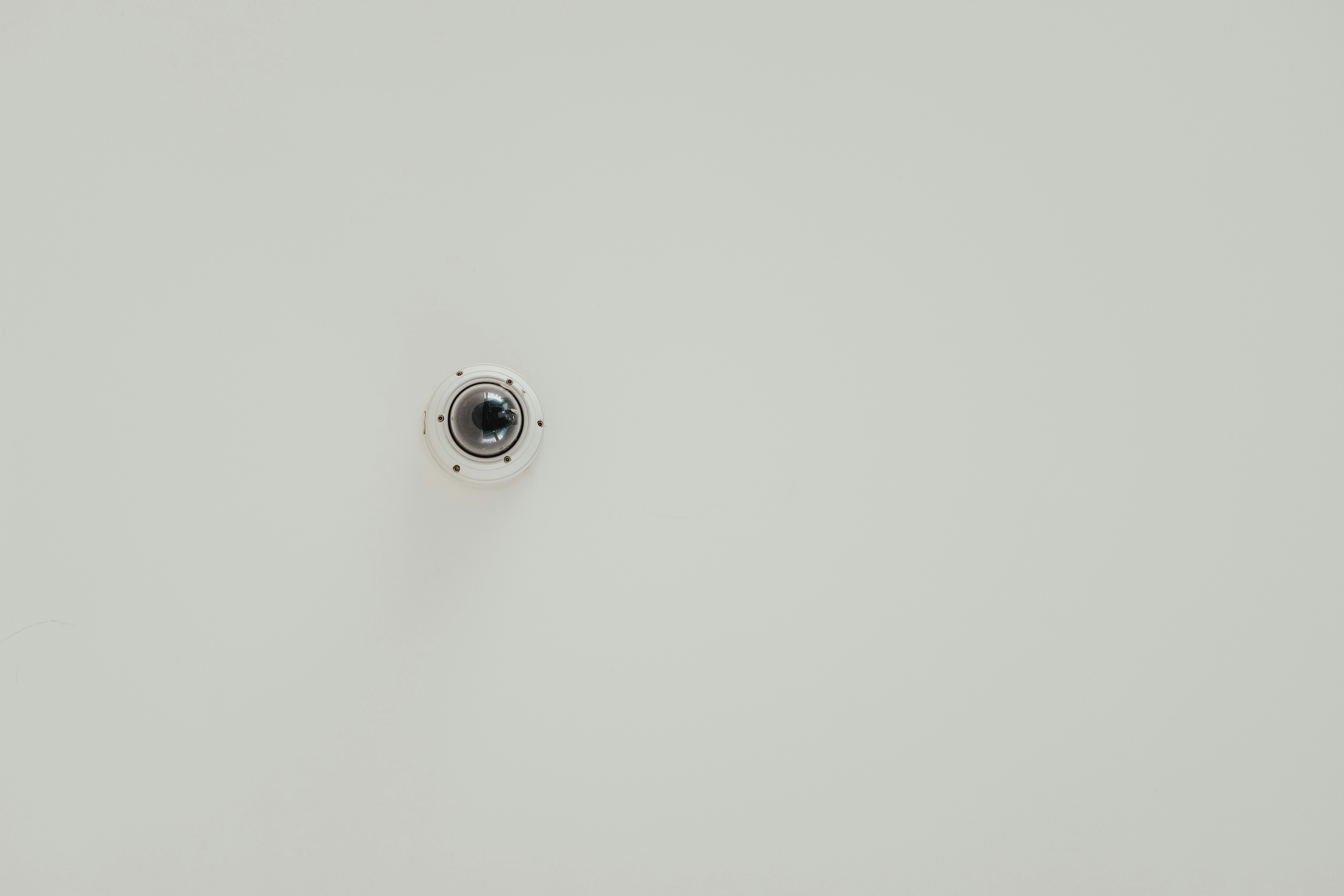 a camera mounted to the side of a wall