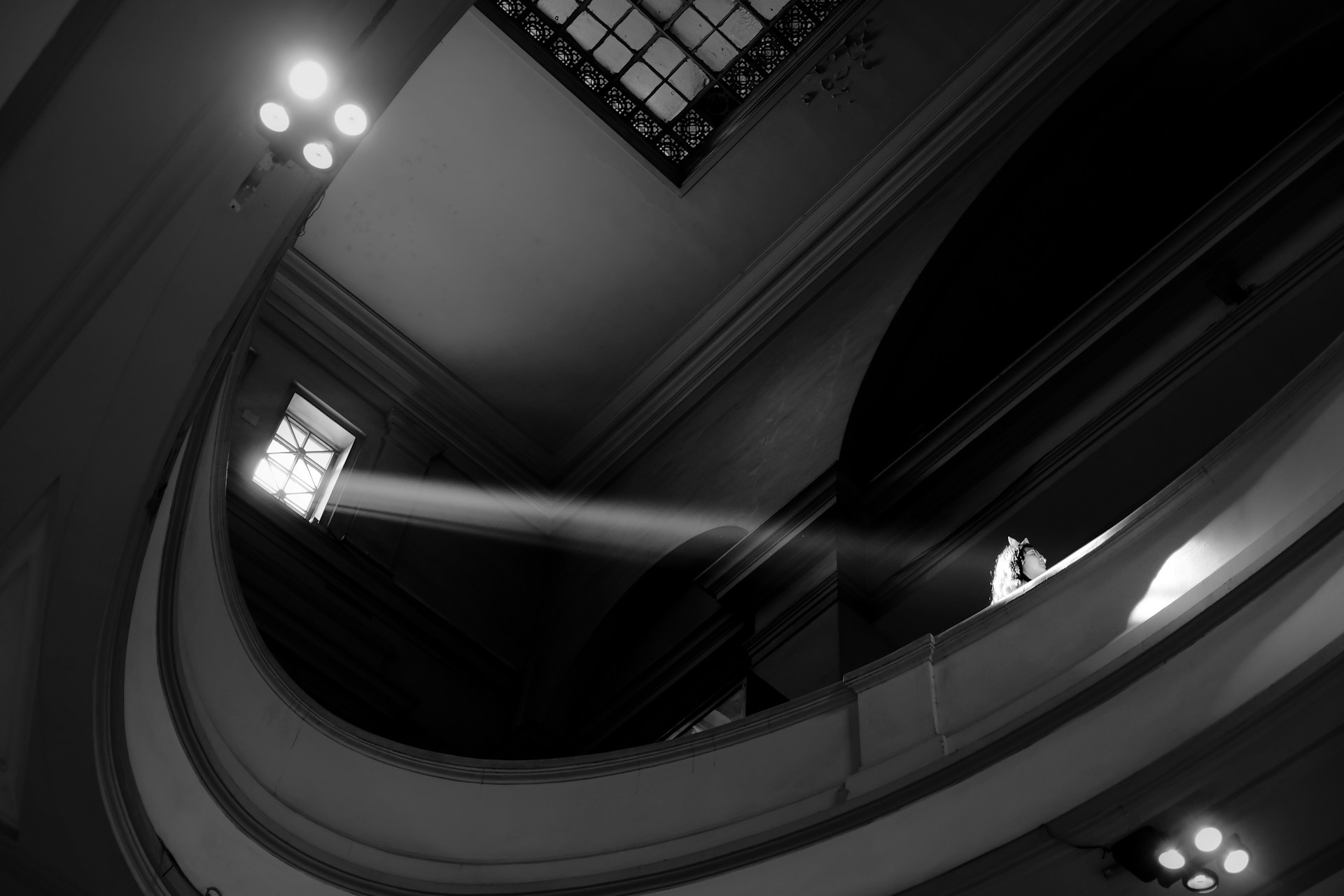 woman wearing yellow long-sleeved dress under white clouds and blue sky during daytime