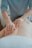 man massaging woman's body