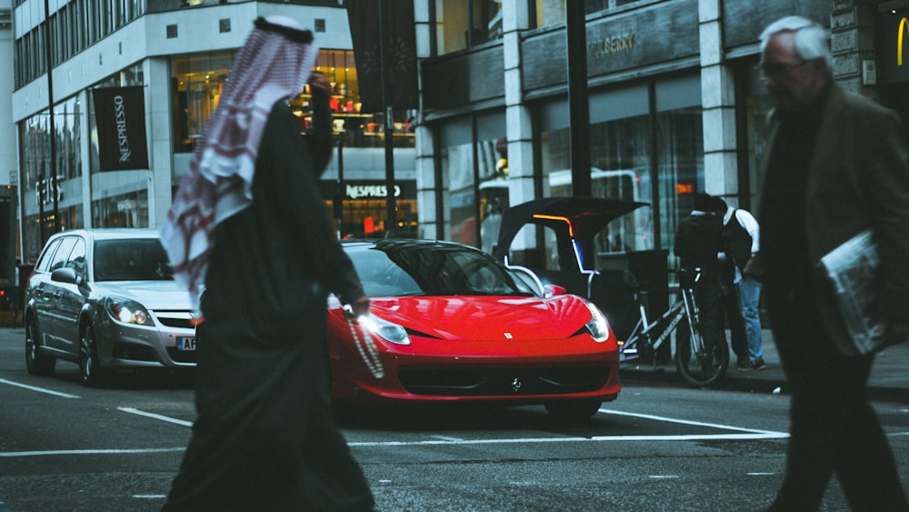 red sports car in street