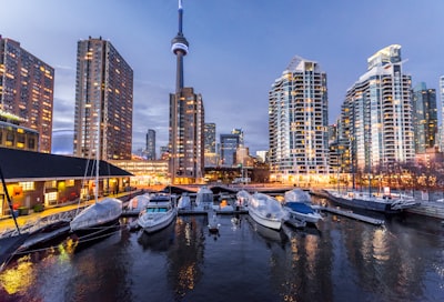 boat beside dock canada teams background