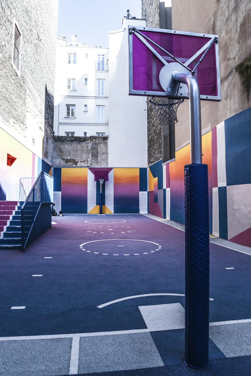 purple and orange basketball court during day time