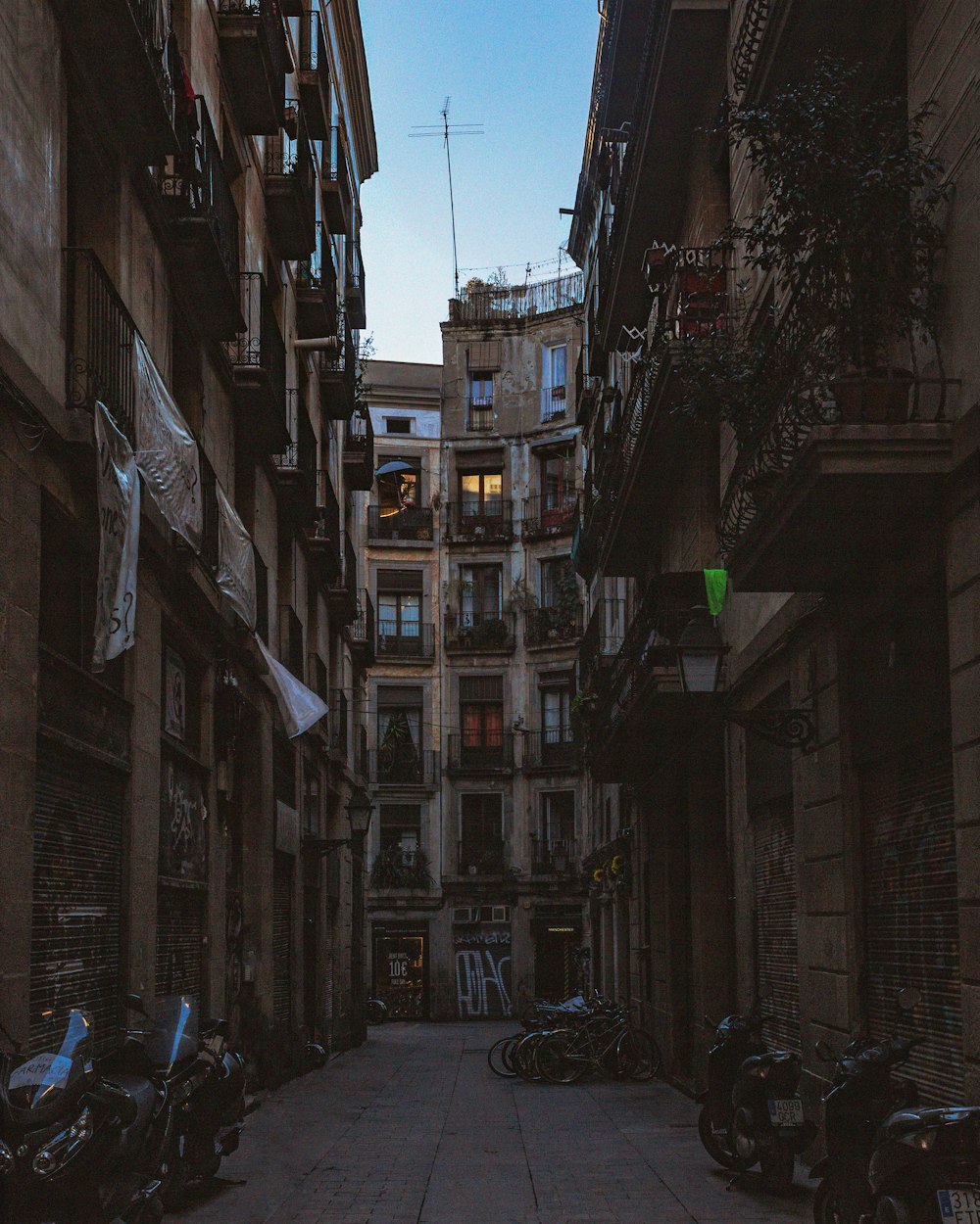 motorcycles between buildings